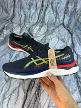 ASICS Gel-Cumulus 24 in the "Navy/Olive Oil Branded Running Shoes